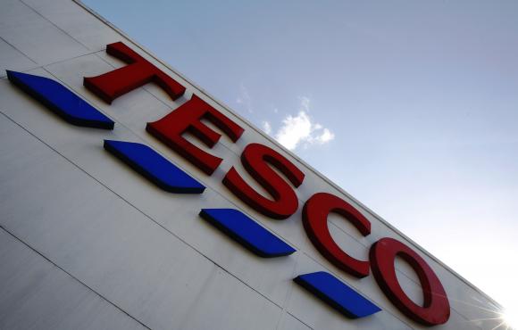 A store sign is seen outside a Tesco supermarket in London